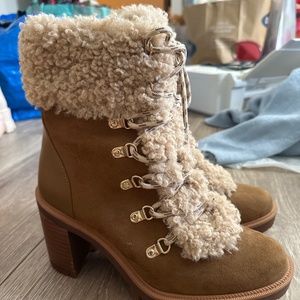 Jennifer Lopez heeled faux fur lace up boots